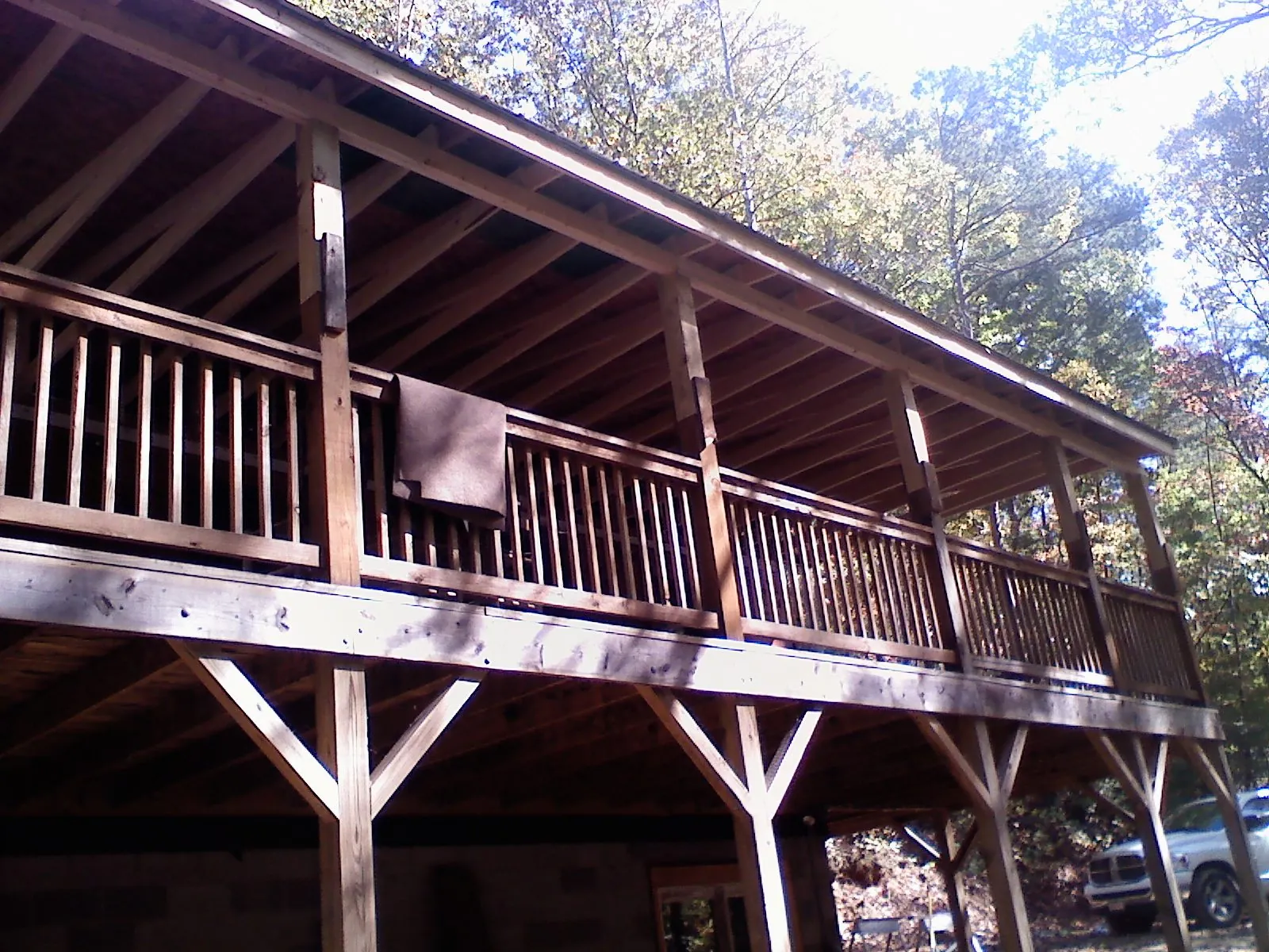 Timber framing under a new elevated porch and deck — Roof Leak Repair in Bostic by Roofing Brothers
